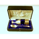 THREE-PIECE SILVER CHRISTENING SET COMPRISING NAPKIN RING, SPOON AND EGG CUP BY WALKER & HALL,