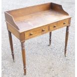 VICTORIAN MAHOGANY TABLE/WASHSTAND WITH TWO DRAWERS, ON FOUR TURNED LEGS AND BRASS CASTERS (90 cm