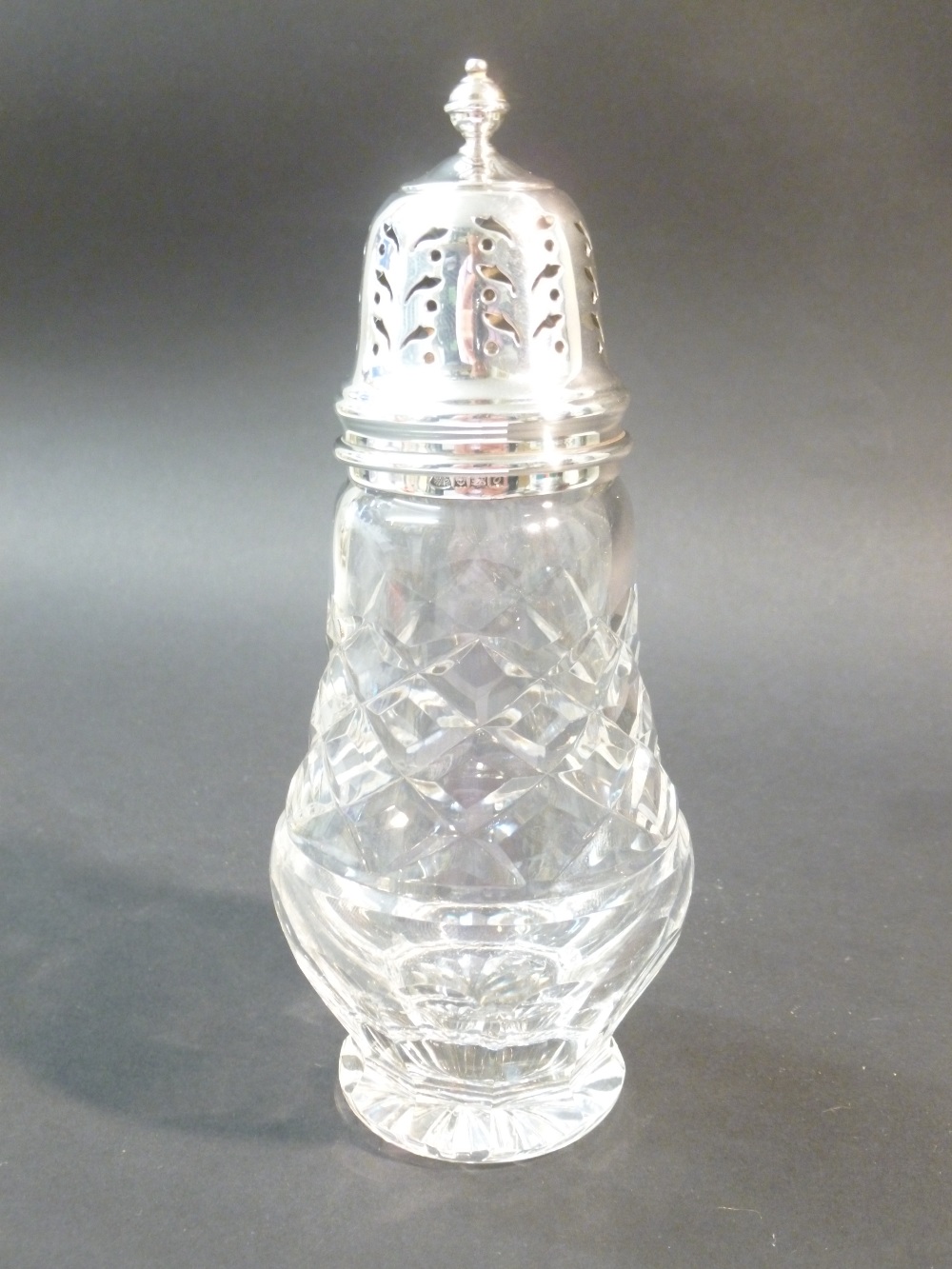 CUT GLASS AND SILVER TOPPED SUGAR CASTER BY ADIE BROTHERS LTD, BIRMINGHAM 1963