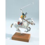 SATURNO STERLING SILVER AND ENAMEL POLO PLAYER AND PONY MOUNTED ON A MAHOGANY PLINTH (H: 14 cm)