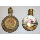 GLASS FILIGREE CASED PERFUME BOTTLE WITH AN EMBROIDERED PANEL, BRASS SCREW TOP LID WITH INTEGRAL