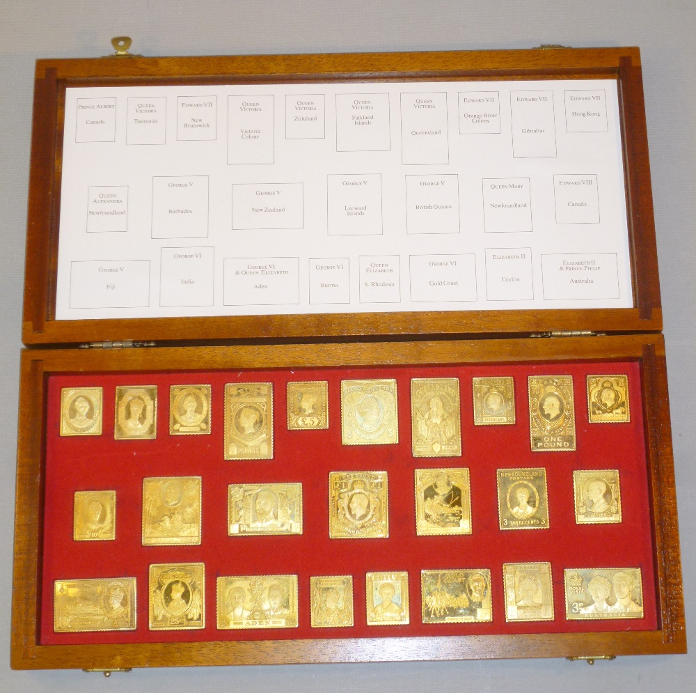 ROYAL STAMPS OF THE EMPIRE, A COLLECTION OF 25 SILVER-GILT REPLICA STAMPS FROM A LIMITED EDITION