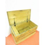 LATE VICTORIAN PINE BLANKET BOX WITH A HINGED TOP DISCLOSING A COVERED COMPARTMENT, AND IRON