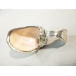 SMALL WHITE METAL CADDY SPOON/SCOOP ENCAPSULATING A SEA SHELL SECTION, MATTHEW LINWOOD, BIRMINGHAM