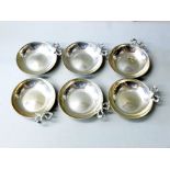 SET OF SIX WHITE METAL DISHES WITH RIBBON HANDLES, STAMPED 925