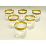 SET OF SIX LEAD CRYSTAL TUMBLERS WITH A GILT BANDING ON SCROLL AND FLORAL ENGRAVING [6]