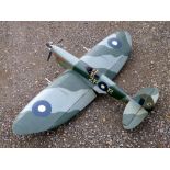 LARGE WORLD WAR II SUPER-MARINE SPITFIRE MODEL AIRCRAFT WITH LINE CONTROLS AND LIVE FUEL MOTOR