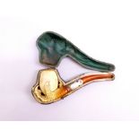 EARLY C20th LARGE MEERSCHAUM PIPE, THE BOWL GRIPPED BY A CARVED EAGLE CLAW, WITH AMBER STEM, IN