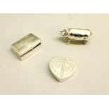 SILVER HEART-SHAPED PILL BOX, THE TWO COMPARTMENTS UNDER A CENTRAL HINGED ENGRAVED COVER, BY ARI D