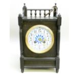 MANTEL CLOCK WITH EIGHT DAY MOVEMENT STRIKING ON A COILED GONG, BLUE PAINTED DIAL IN EBONISED CASE