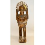 AFRICAN FERTILITY SCULPTURE, FIGURE HOLDING A BABY, FIGURE'S HEADRESS DECORATED WITH COWRIE SHELLS