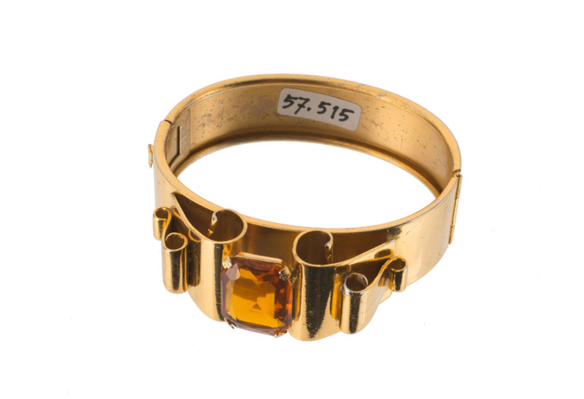 A Coro bracelet set with orange stone. Signed Coro. Inner diam. 6 cm. Some wear to the gold tone.