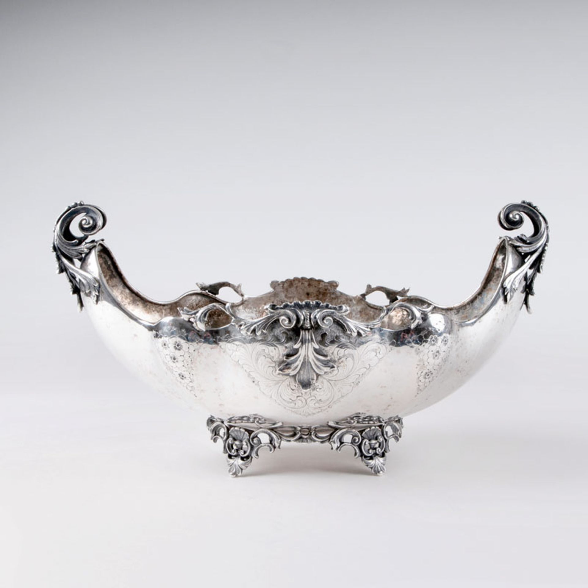A jardinière of Rococo style Germany, end of 19th cent. Silver, stamped indistinct, '800'. Richly