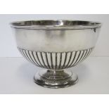 A SILVER ROSE BOWL, ATKIN BROTHERS, SHEFFIELD, 1956 the circular body with gadrooning, raised on a