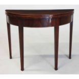 A GEORGE III MAHOGANY CARD TABLE MANUFACTURED BY SIMKIN, COLCHESTER the hinged demi-lune crossbanded