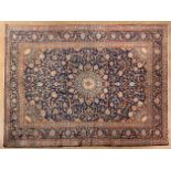 A  KHOROSSAN CARPET, PERSIA, MODERN the deep indigo-blue field with a pale blue floral star