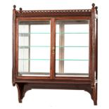 A MAHOGANY HANGING DISPLAY CABINET, EARLY 20TH CENTURY the rectangular top surmounted by a pierced