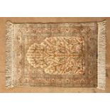 A HEREKE SILK PRAYER RUG, TURKEY, MODERN the ivory mehrab with an ascending flowering tree and