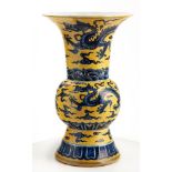 A CHINESE YELLOW-GROUND 'DRAGON' PATTERN GU VASE, EARLY 20TH CENTURY the globular body with