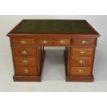 A VICTORIAN MAHOGANY PEDESTAL DESK the rectangular top with a gilt-tooled leather-inset writing