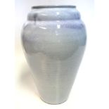 A LINNWARE VASE, 1940s the lobed tapering ovoid body with overall streaked lavender glaze, painted