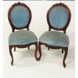A PAIR OF MAHOGANY PARLOUR CHAIRS, 19TH CENTURY each oval padded back within a moulded conforming