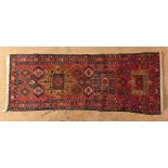 A KARADJA FLATWEAVE RUNNER, NORTH WEST PERSIA, CIRCA 1950 the red field with three Karadja