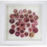 A MISCELLANEOUS GROUP OF UNMOUNTED CIRCULAR- AND CUSHION-CUT TOURMALINES various shades of pink