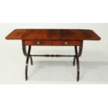 A FLAME MAHOGANY SOFA TABLE, LATE 19TH CENTURY the crossbanded rectangular top with hinged rounded
