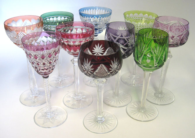 A MISCELLANEOUS GROUP OF COLOURED CUT-GLASS DRINKING GLASSES of various colours and designs (10)