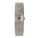 A LADY'S 18CT WHITE GOLD WRISTWATCH, LONGINES manual, the square-shaped textured dial applied with