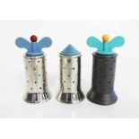 A SALT SHAKER AND TWO PEPPER MILLS DESIGNED IN 1988 BY MICHAEL GRAVES FOR ALESSI the salt shaker