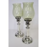 A PAIR OF VICTORIAN ELECTROPLATE CANDLESTICKS each cylindrical stem with foliate knop, pierced