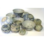 A MISCELLANEOUS GROUP OF SOUTHEAST ASIAN BLUE AND WHITE WARES each variously glazed, comprising: 8