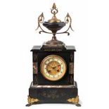 A FRENCH MARBLE AND SLATE MANTEL CLOCK, CIRCA 1856 the 8,5cm enamelled dial with Arabic numerals,
