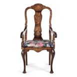 AN ENGLISH WALNUT MARQUETRY ARMCHAIR, 18TH CENTURY the shaped top rail centred by a shaped splat