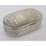 A GEORGE III SILVER PILL BOX, SAMUEL PEMBERTON, BIRMINGHAM, 1802 the oval body decorated with a