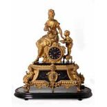 A FRENCH ORMOLU BRONZE AND SLATE MANTEL CLOCK, CIRCA 1860 the 7,5cm black enamelled dial with