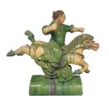 A CHINESE GLAZED POTTERY EQUESTRIAN GROUP ROOF TILE, MING DYNASTY, 1368-1644 glazed in green and