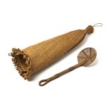 A ZULU BEER STRAINER AND SKIMMER the strainer of typical form, the skimmer of woven grass, the