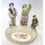 A MEISSEN RETICULATED BASKET, 20TH CENTURY oval, the interior painted with a floral spray, gilt