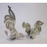 A PAIR OF SILVER FIGURES OF FIGHTING COCKS, STERLING SILVER, 20TH CENTURY realistically modelled,