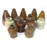 A MISCELLANEOUS GROUP OF STONEWARE INK POTS of various forms, in sizes, including: tapering