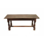 A CAPE STINKWOOD TABLE, 19TH CENTURY the rectangular moulded top with notched corners above a