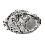 AN ART NOUVEAU ELECTROPLATE WALL PLAQUE, WMF, CIRCA 1900 the oval body with a scantily clad mother