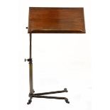A VICTORIAN MAHOGANY READING TABLE MANUFACTURED BY CARTERS OF LONDON the adjustable hinged top above