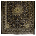 A MESHED CARPET, EAST PERSIA, MODERN the dark indigo-blue field with a floral pale blue and beige