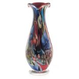 A LARGE MURANO MILLEFIORI VASE the tapering ovoid body with organic rim on a circular clear base, in