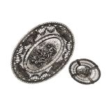 TWO GERMAN SILVER DISHES, .800 STANDARD each pierced oval body, with flowerheads, swags and scrolls,