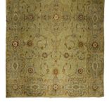 A KESHAN CARPET, PERSIA, MODERN the pale green field with a floral medallion all with polychrome